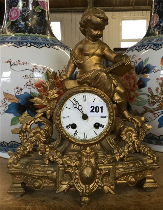 Gilt metal clock with putti